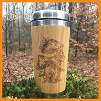 Bamboo Travel Mug with Amanita Mushrooms engraving in the forest moss